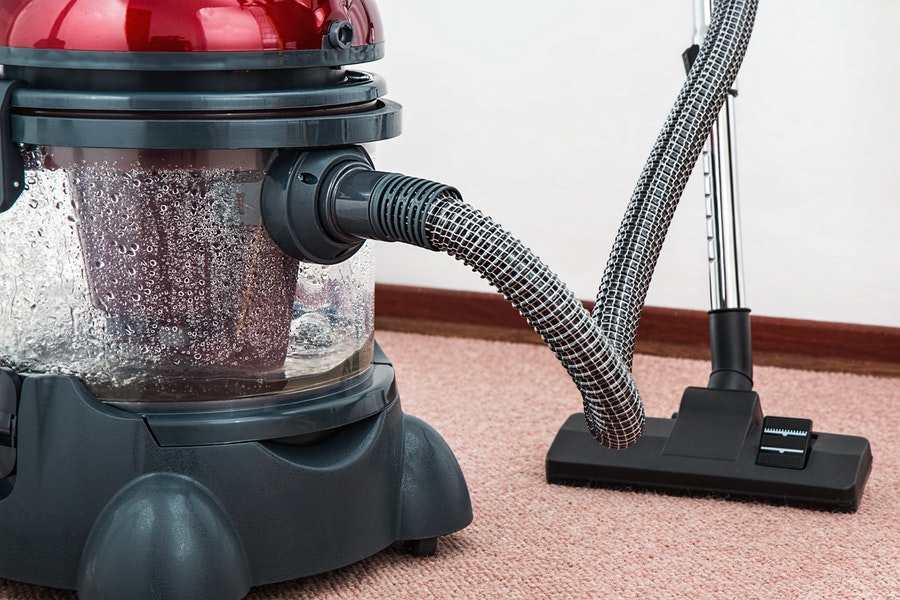 Vacuuming Floor