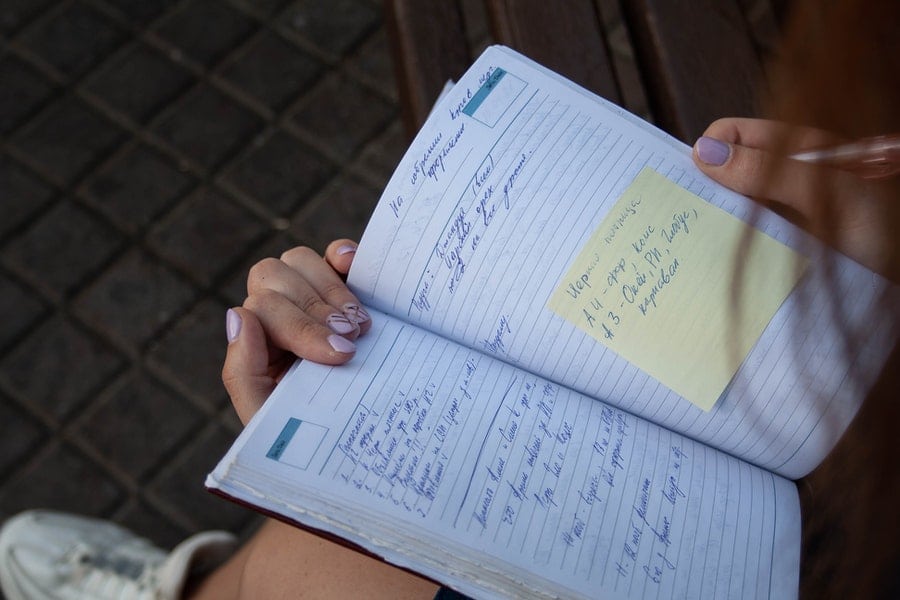 woman-holding-a-planner