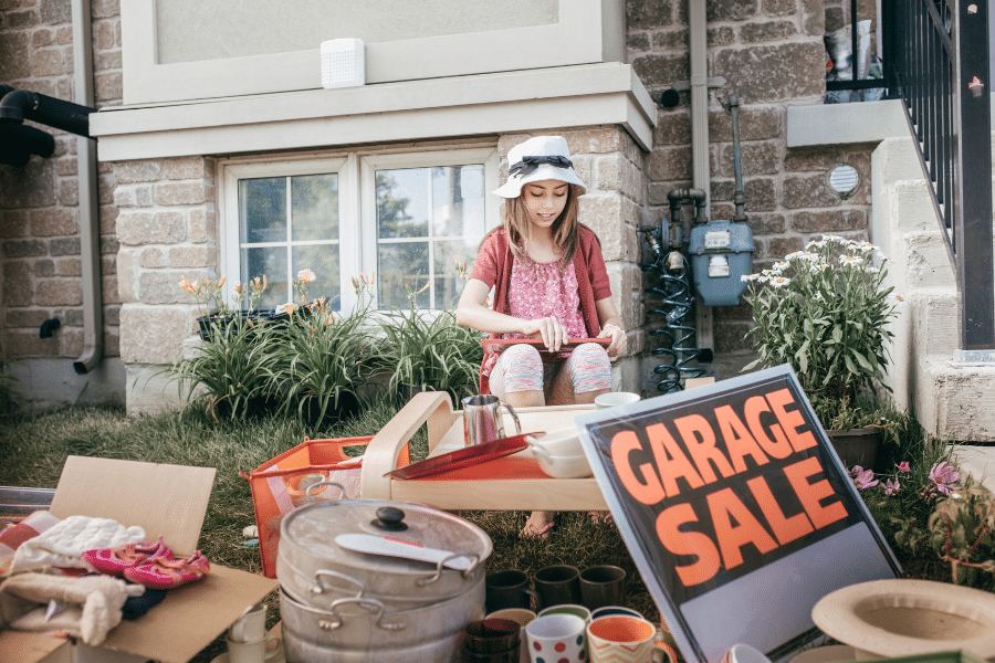 Look for economical items at garage sales for storage bags, drawer organizers and other supplies.