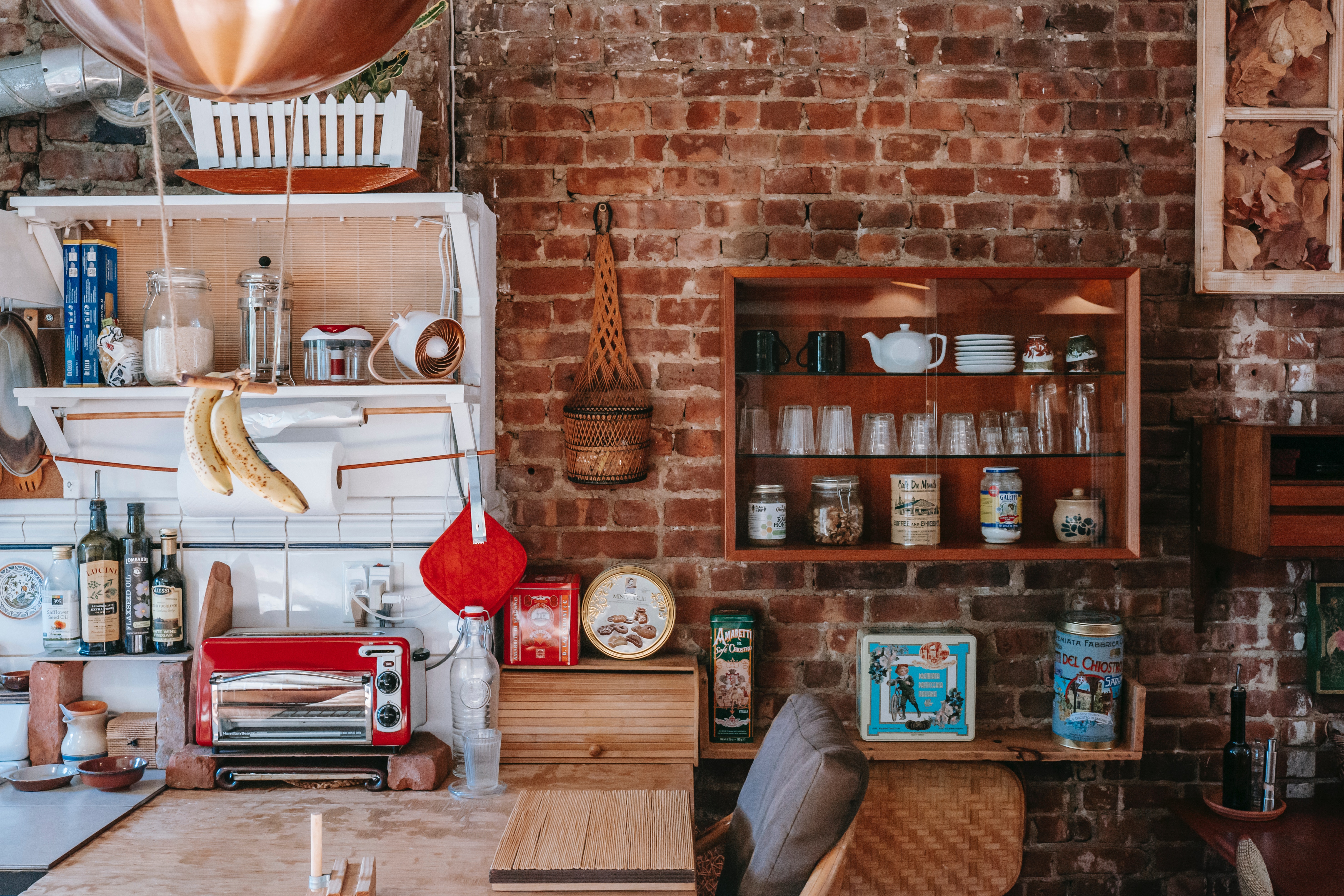 modern kitchen with utensils on open shelves