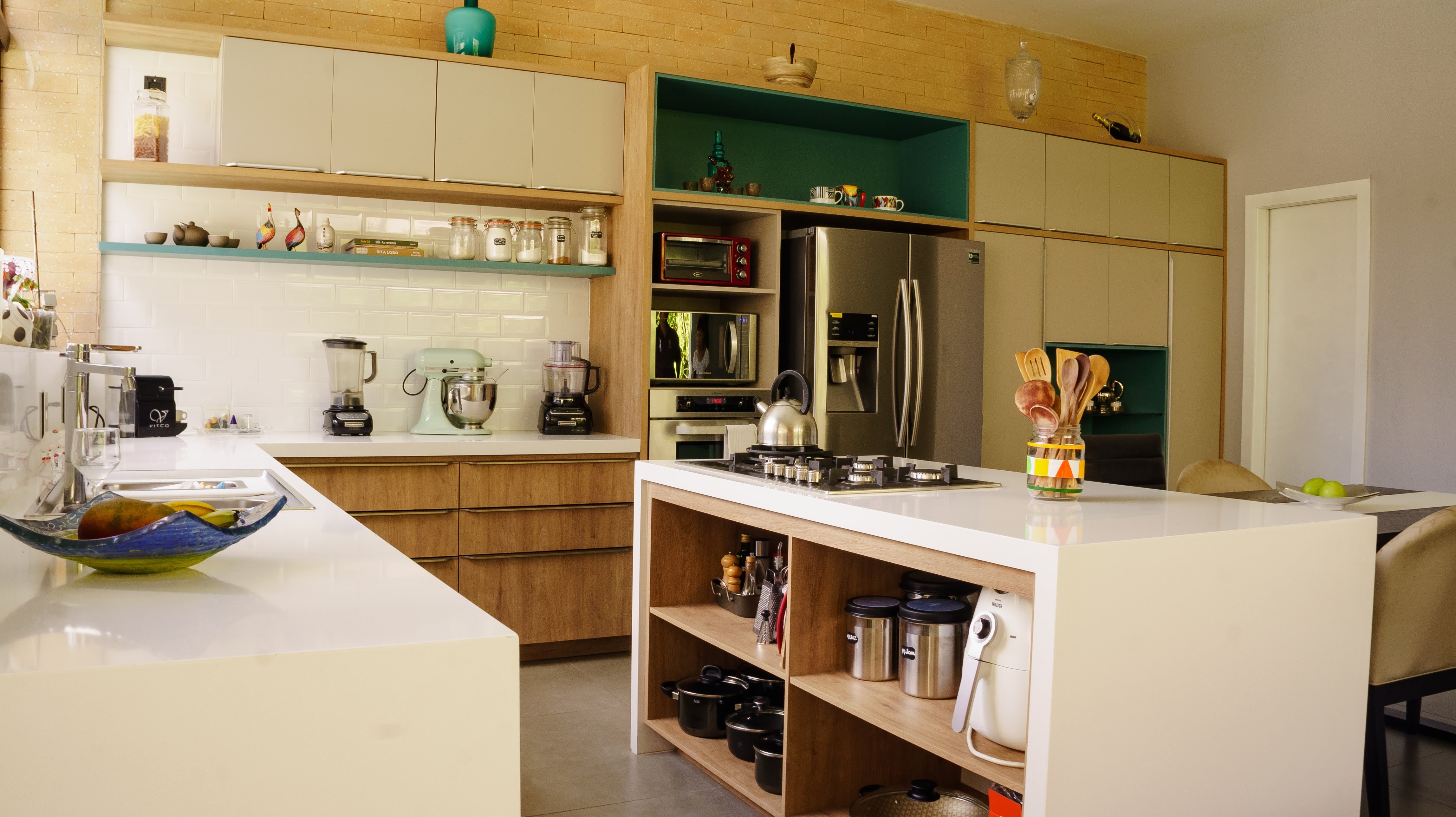 modern furniture and kitchen utensils in spacious kitchen