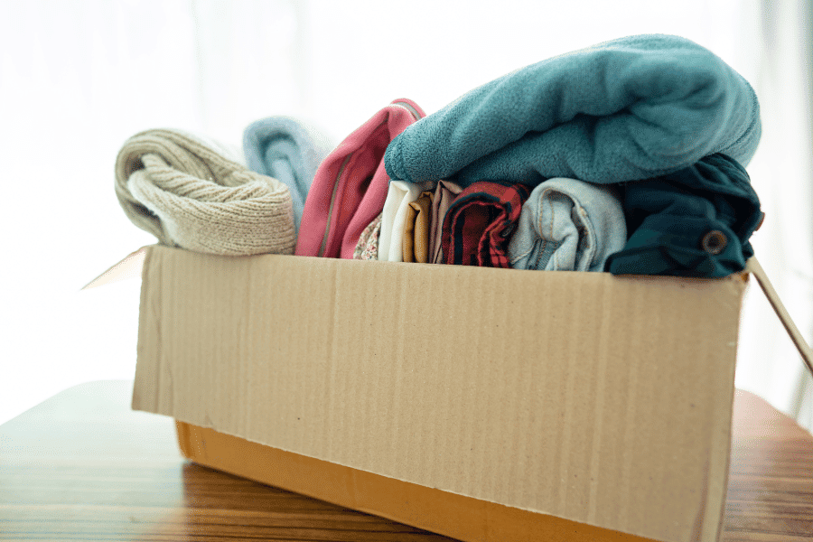 Clothes piled in a box