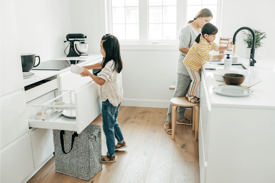 A mother and her kids doing chores