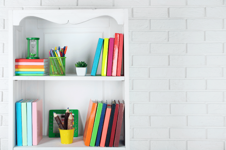 books neatly organized in a cabinet