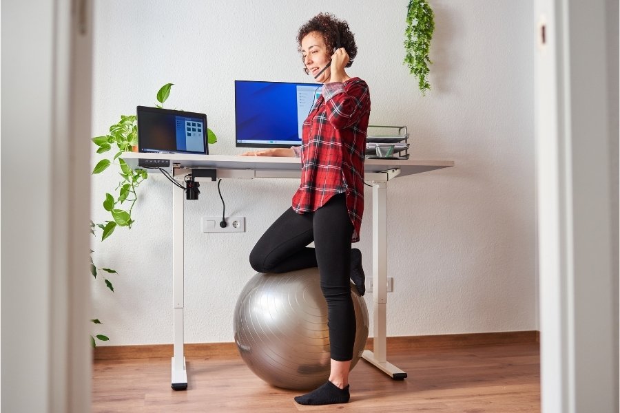 lady standing by her desk