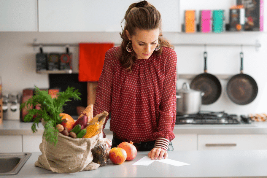 a woman checking on her list