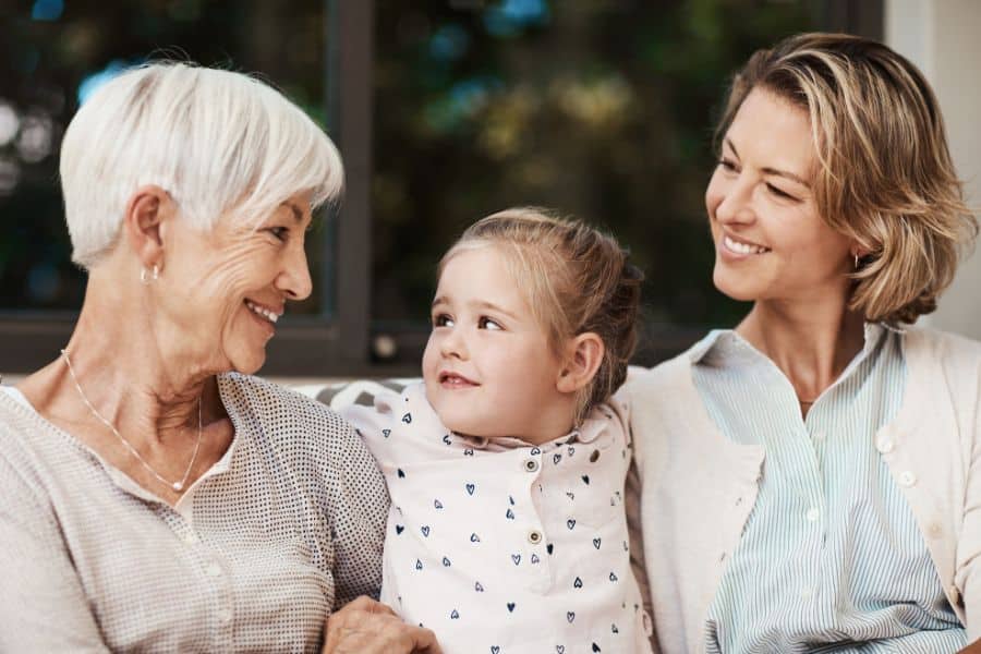 A woman with her daughter and her mother