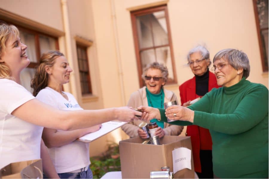 Ladies happily sharing stuff with each other