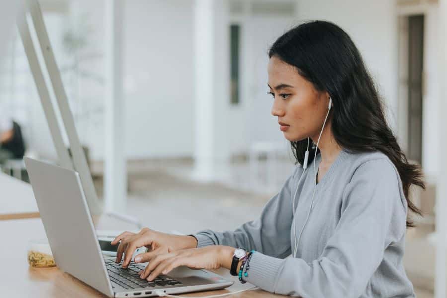 a woman going through her files in her laptop