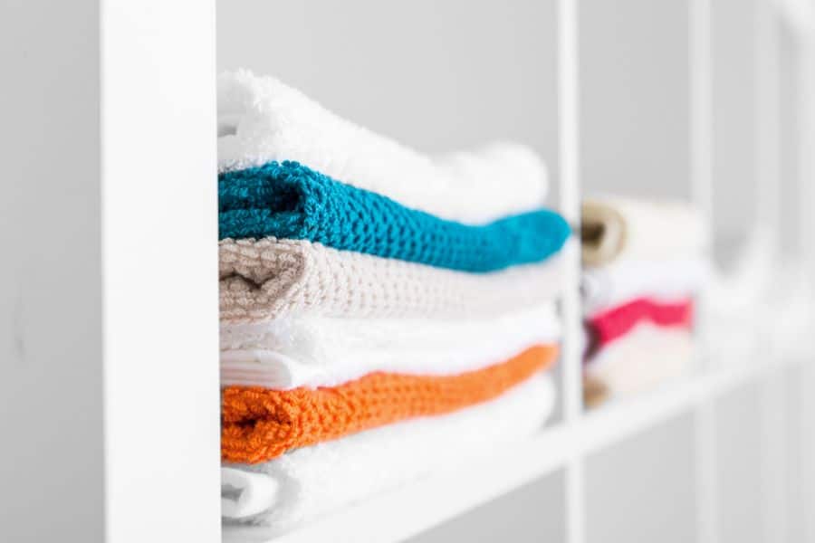 closet with organized linens