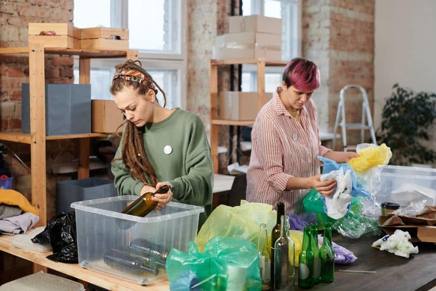 Mother and daughter checking items to reuse